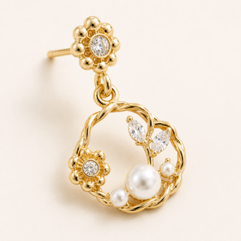 Close detail of the floral frame and pearl-style round elements