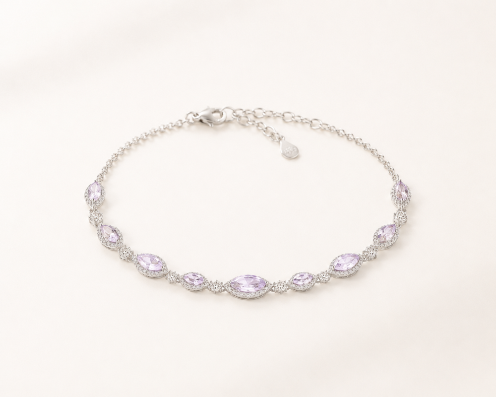 Lilac marquise stone bracelet on a warm white background
