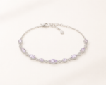 Lilac marquise stone bracelet on a warm white background