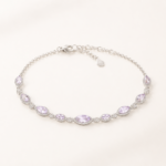 Lilac marquise stone bracelet on a warm white background